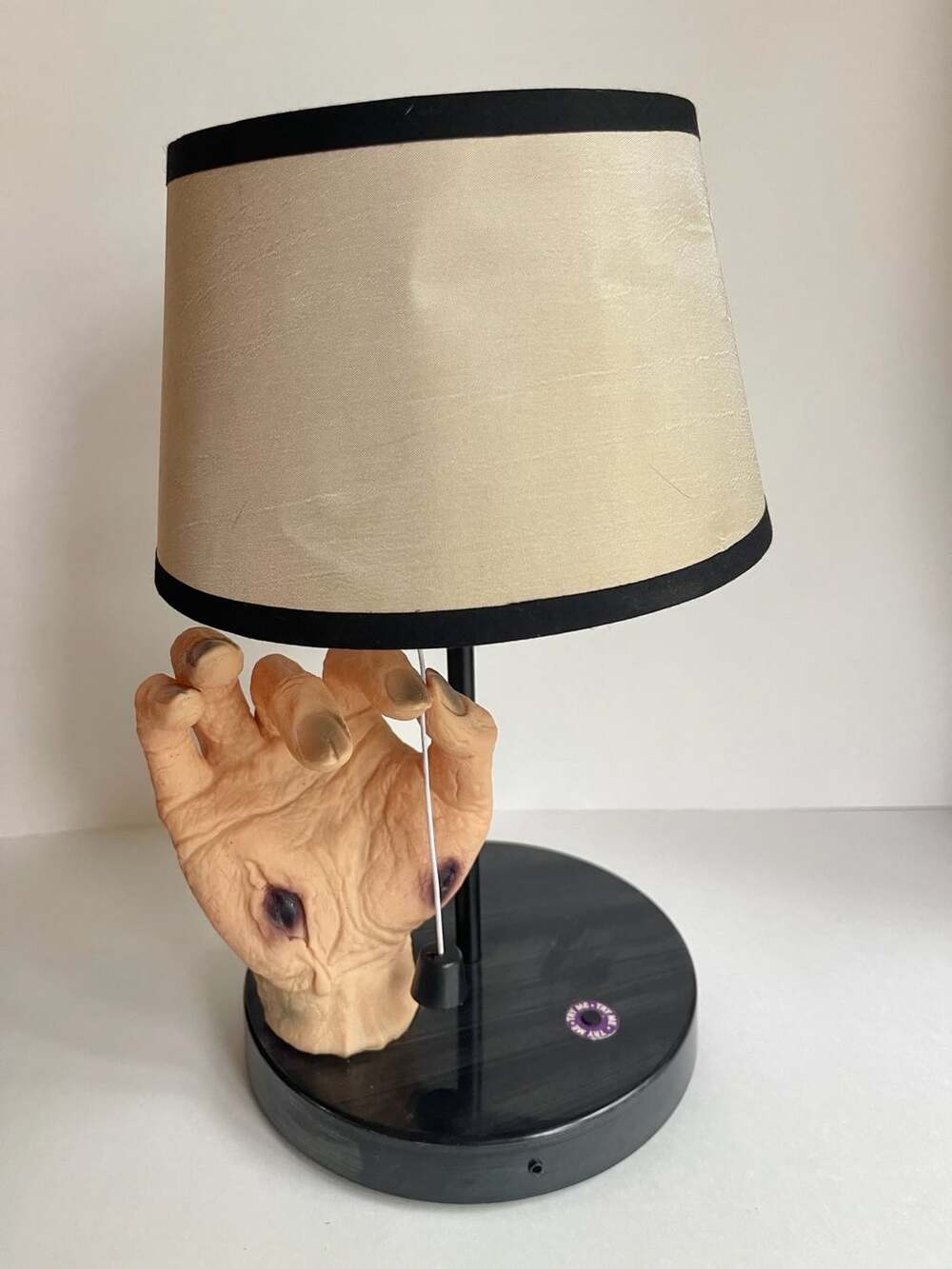 Giggles International Limited Zombie Hand Table Lamp with Black Base and Beige